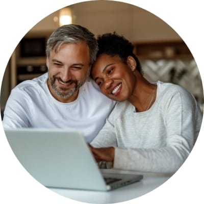 A couple looking at laptop